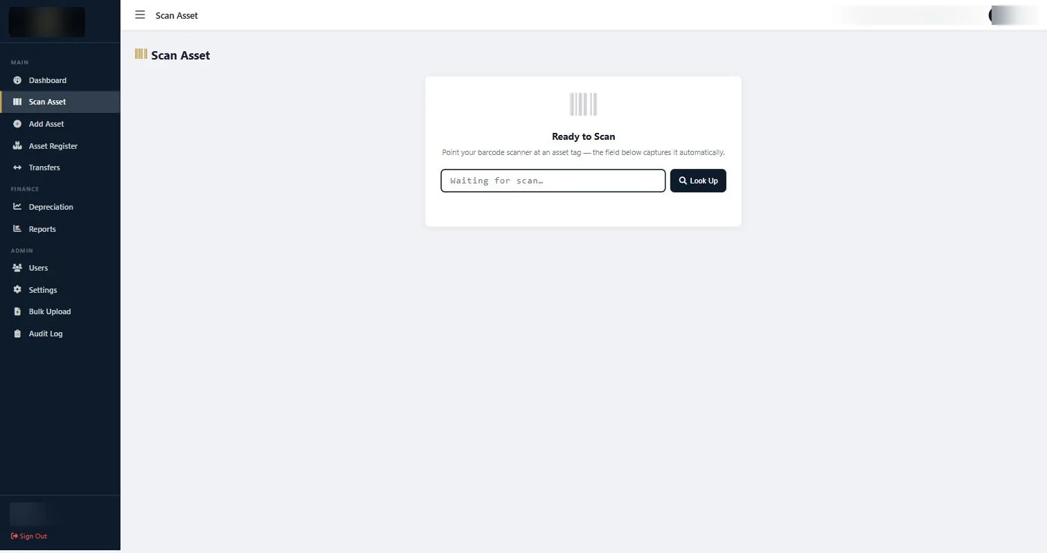 Scan Asset screen in the STL asset management system with a barcode scanned and the matching asset record displayed