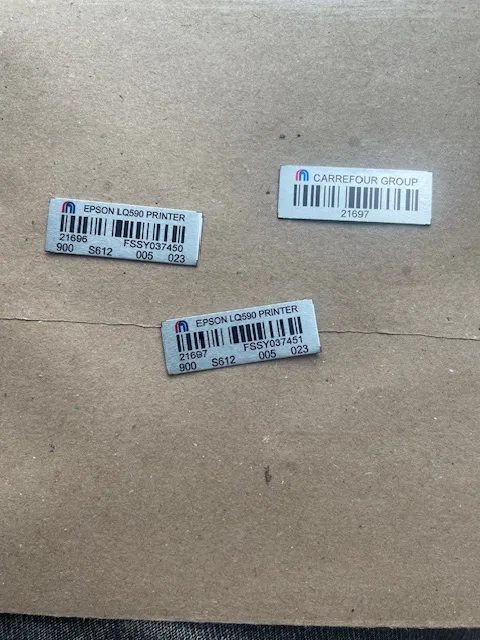 Self-adhesive barcode asset tags produced by STL Asset Solutions for IT equipment